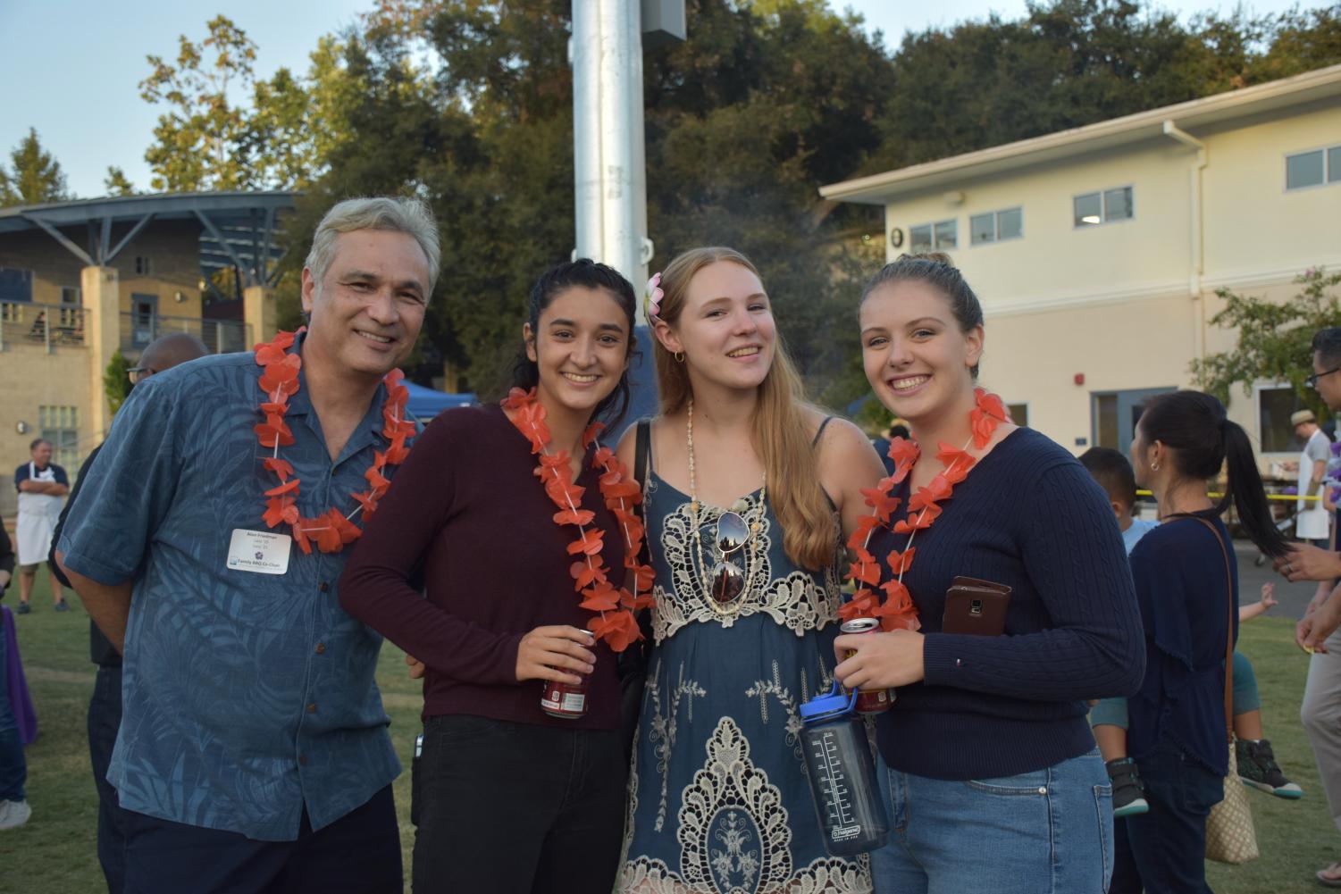 Mr. Friedman, Lara Friedman '19, Sinclaire Ledahl '19 and Danielle Maxwell '19 at the family BBQ.