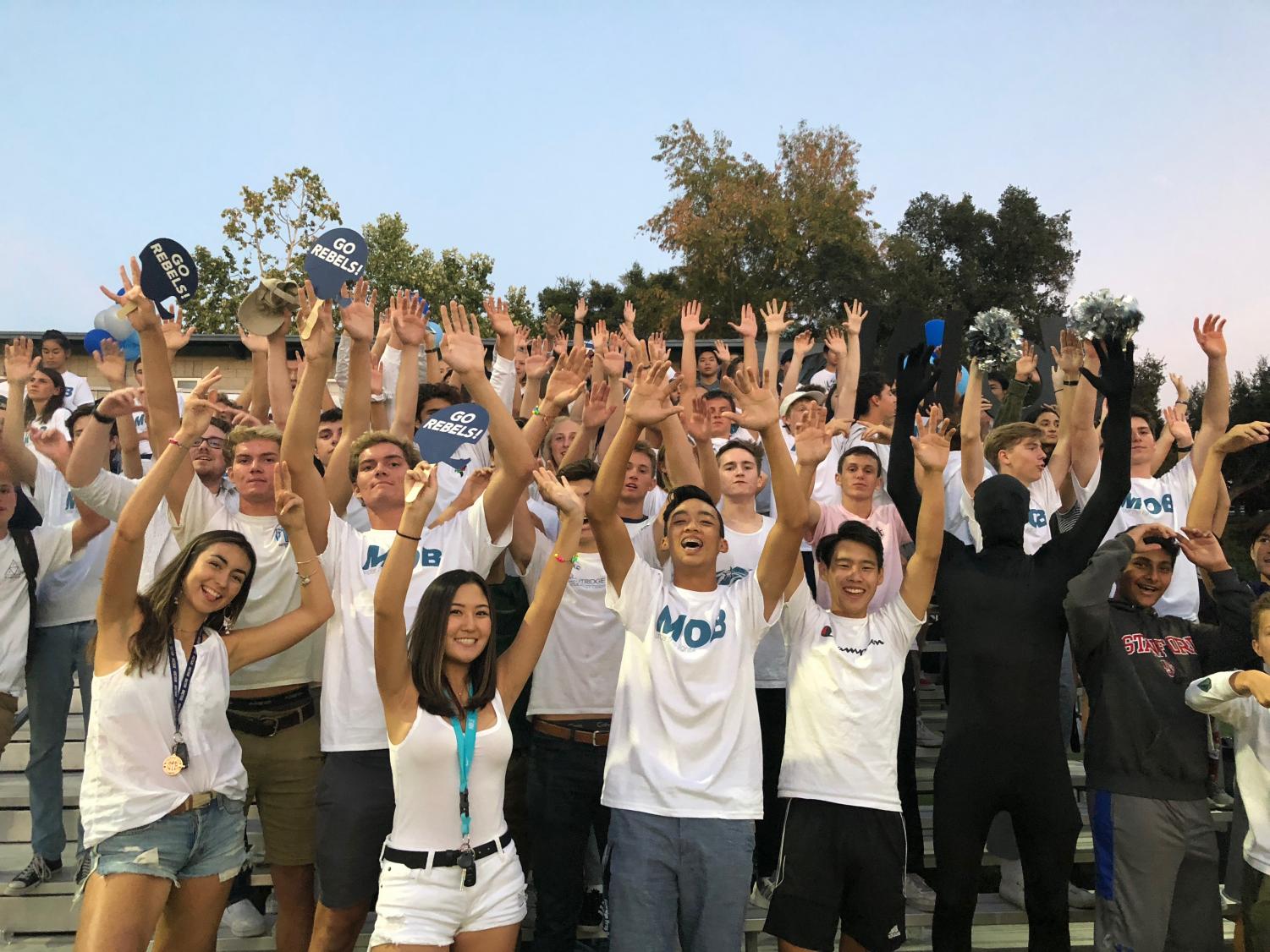 The MOB cheers on the Rebels' Football.