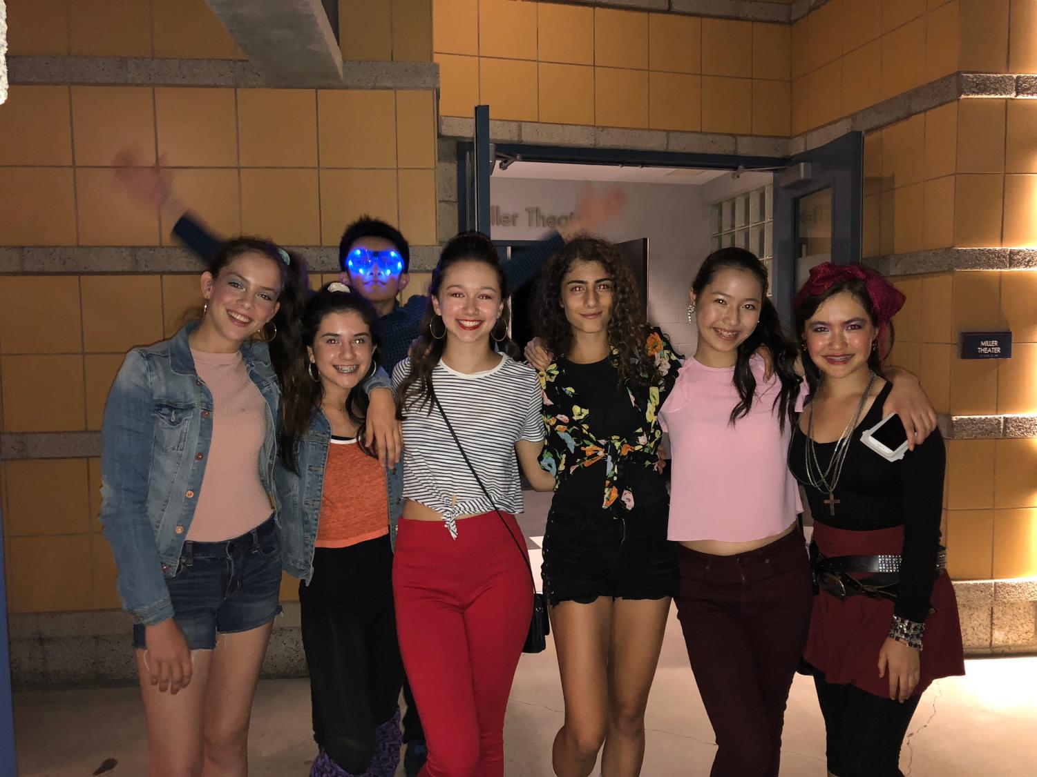 Ethan Wong '21 photobombs Ella Johannes '21, Maya Le '21, Madison Jaffrey '21, Silvia Ioannou '21, Elaine Cheng '21, and Claire Senft '21 as they pose for a picture at the Decade Dance.