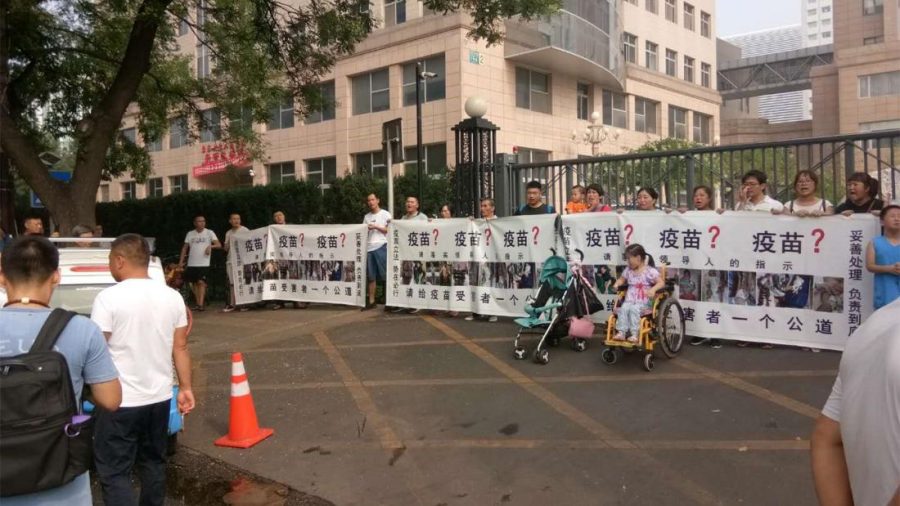 Protest over Chinas fake vaccine scandal.