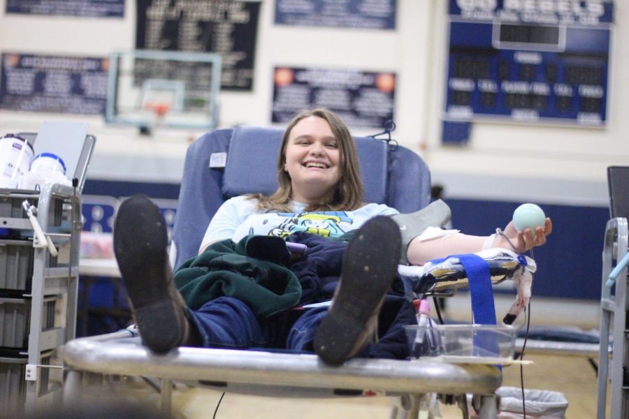 Lindsay Browne '20 donates blood at the blood drive.