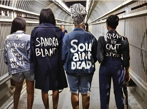 Activists calling out issues of the fashion industry (Photo Courtesy Shayla Janel Hill).
